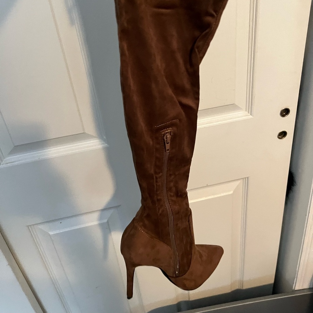 Suede boots.  Size 8.  Never worn.  4 “ heel